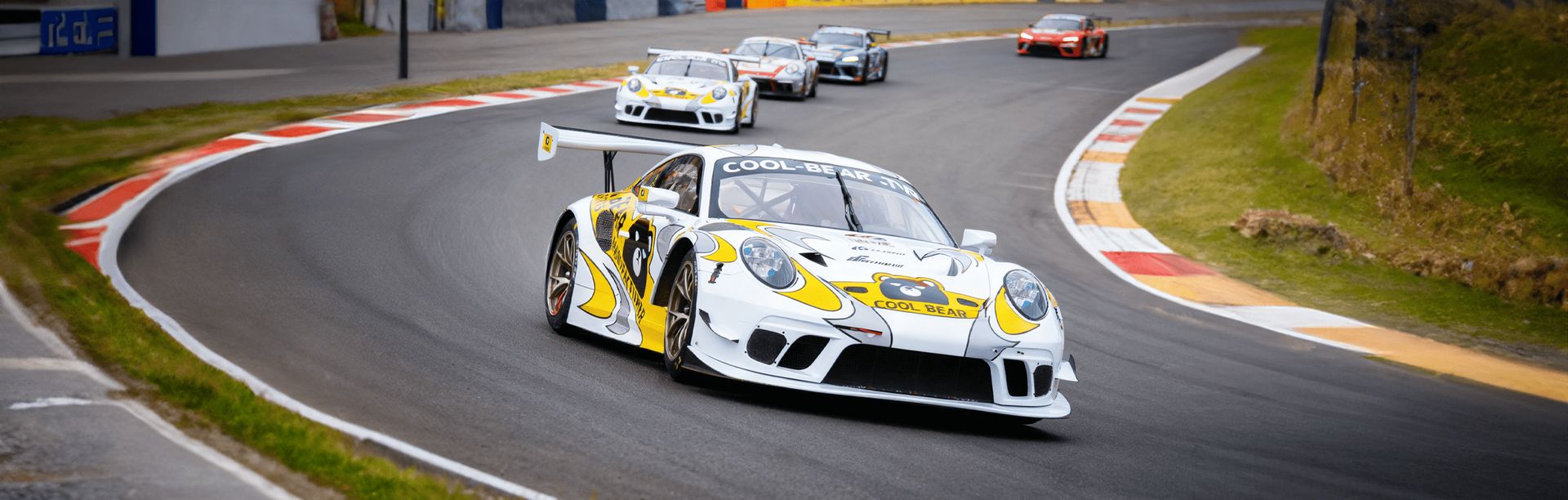 TW RACING race car leading the field on track