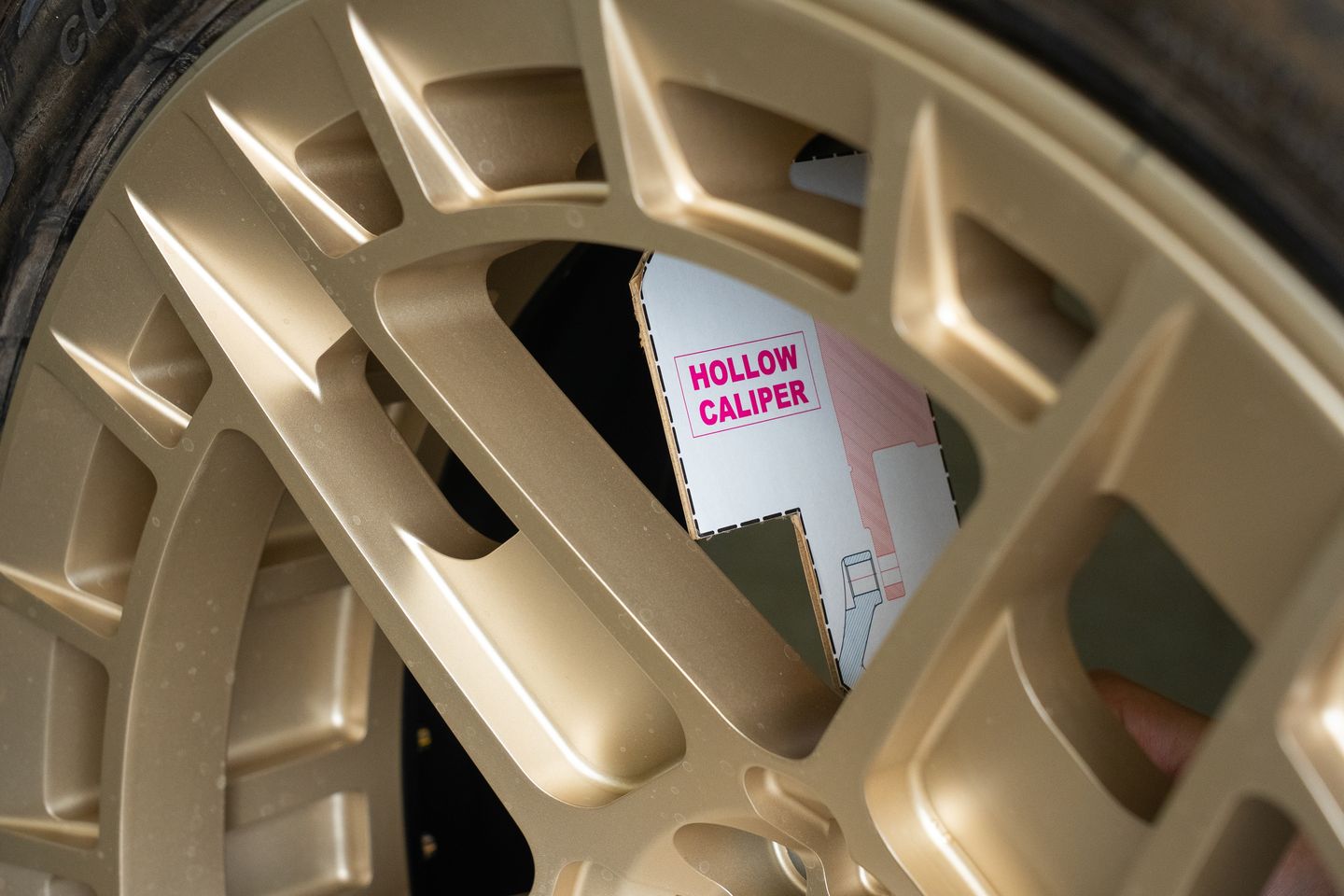 Step 4 of measuring the caliper clearance
